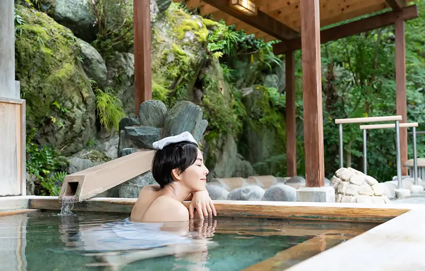 People relaxing in an open-air bath
